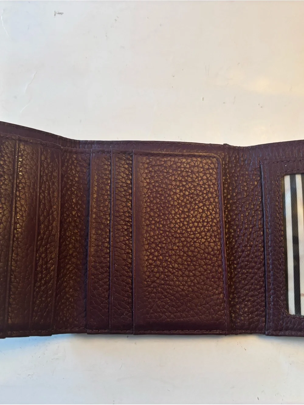 kate spade plum pebbled leather trifold wallet with gold logo